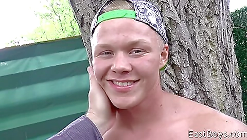 Blonde with a shaved pussy takes on a hot guy outdoors