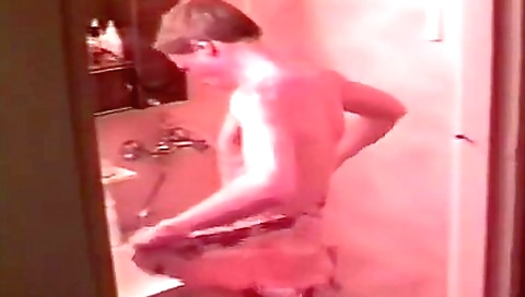 amateur vintage video shows an old man and a teenage son