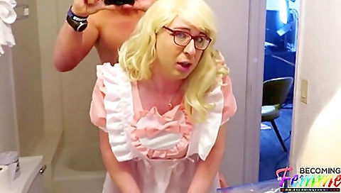 A blonde babe is getting a big black cock in her bare ass
