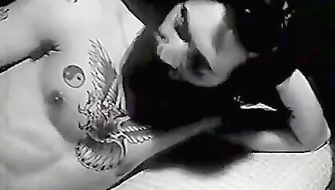 Teenage girl gets her legs pulled up in a tight vintage leather skirt