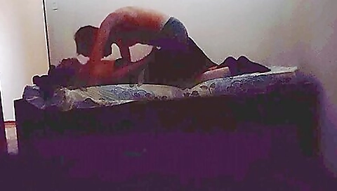 A sexy and busty brunette with big boobs in the peeping video