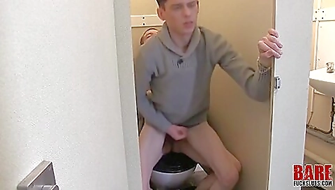 Big cock brunette sucks on her man's dick in the bathroom